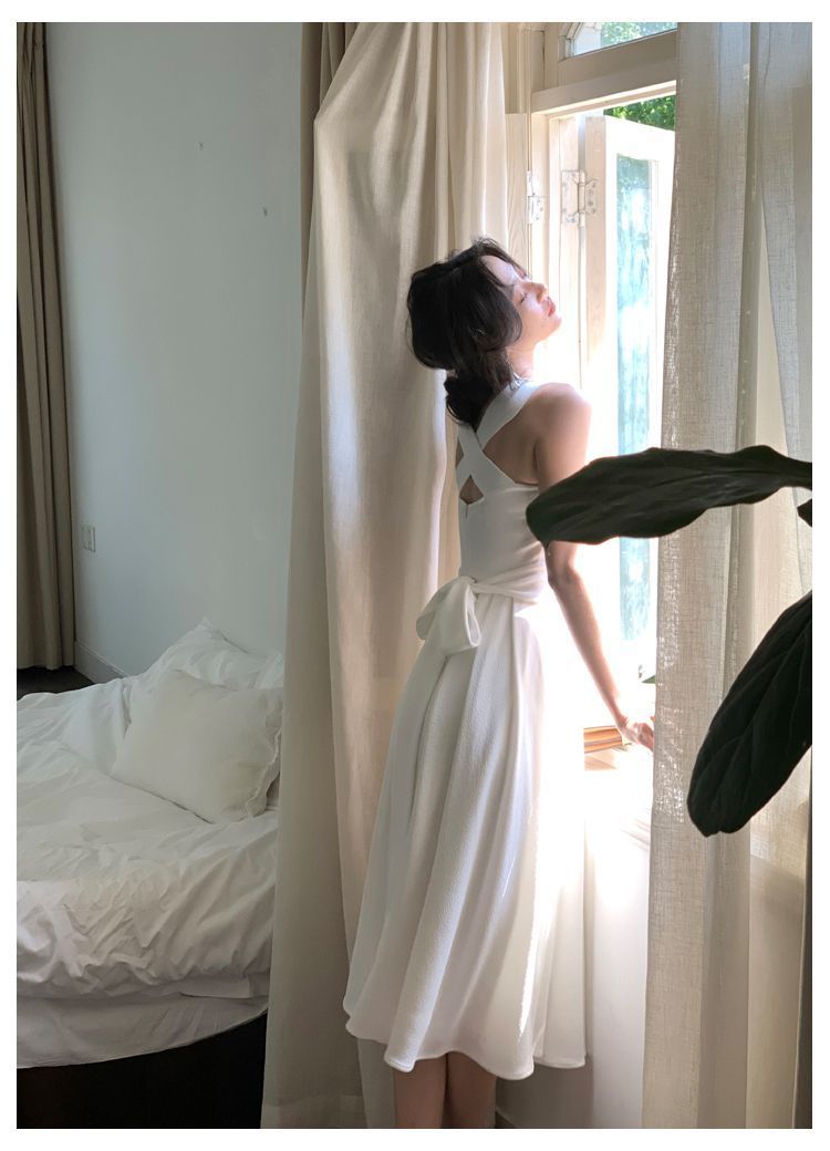Elara Cross-Back Midi Dress – Elegant White A-Line Dress