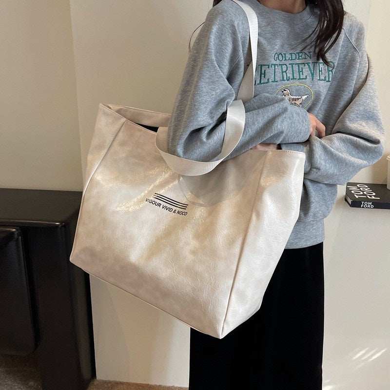 Sleek High Capacity Leather Shoulder Bag