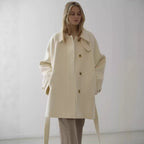 Elegant loose-fitting belted mid-length stand collar coat