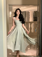 Cascading Ruffle High-Low Midi Dress